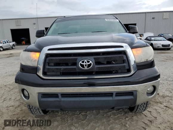 2013 Toyota Tundra z VIN 5TFUM5F1XDX046077, wystawiony jako Copart lot #65893365 z przebiegiem 240 153 mil mil oraz Szkoda całkowita • Salvage title. Historia ofert i sprzedaży dostępna na DreamBid. Obrazek 5.