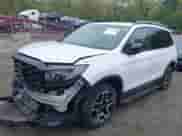 2023 Honda Passport Elite z VIN 5FNYF8H00PB022743, wystawiony jako IAAI lot #42192958 z przebiegiem 25 165 mil mil oraz . Historia ofert i sprzedaży dostępna na DreamBid. Obrazek 17.