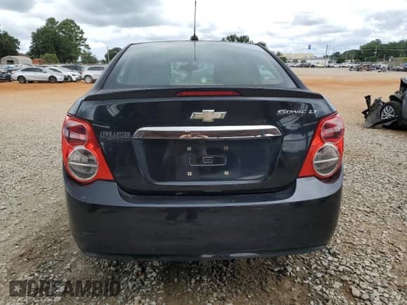 2015 Chevrolet Sonic LT with VIN 1G1JD5SH5F4156716, listed as a Copart auction lot 68521285 with 135,574 mi miles and Salvage title. Bid and sale history available at DreamBid. Image 6.