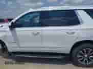 2021 Chevrolet Tahoe LT z VIN 1GNSKNKD0MR488813, wystawiony jako IAAI lot #42418044 z przebiegiem 34 666 mil mil oraz . Historia ofert i sprzedaży dostępna na DreamBid. Obrazek 13.