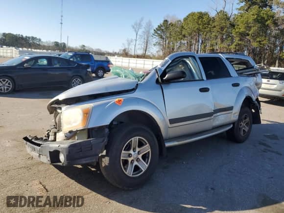 2006 Dodge Durango SLT с VIN 1D4HD48NX6F160331, выставлен на аукционе Copart как лот 48806685 с пробегом Не указан миль и Списание • Salvage title. История ставок и продаж доступна на DreamBid. Изображение 1.