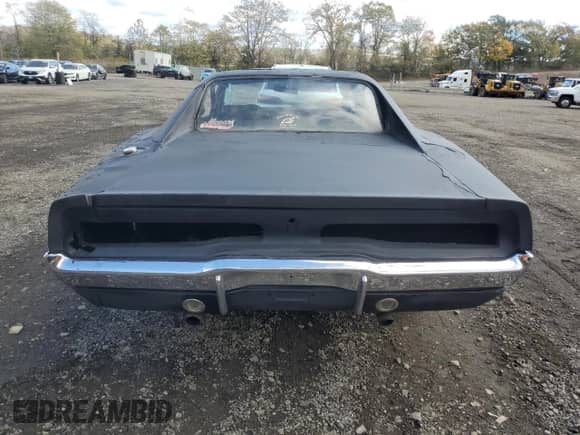 1969 Dodge Challenger with VIN XP29G9B144209, listed as a Copart auction lot 87404125 with 94,477 mi miles and Salvage title. Bid and sale history available at DreamBid. Image 6.