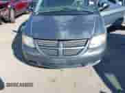 2006 Dodge Grand Caravan SE z VIN 1D4GP24R86B735629, wystawiony jako IAAI lot #43468974 z przebiegiem 206 699 mil mil oraz . Historia ofert i sprzedaży dostępna na DreamBid. Obrazek 6.