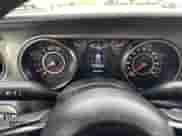 2022 Jeep Wrangler Unlimited Willys with VIN 1C4HJXDN6NW195685, listed as a IAAI auction lot 43470381 with 142,158 mi miles and . Bid and sale history available at DreamBid. Image 7.