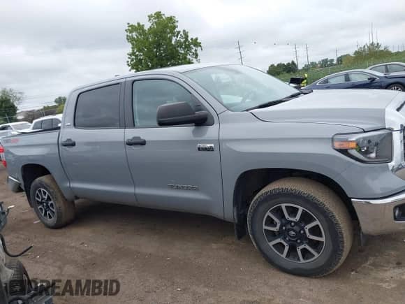 2021 Toyota Tundra SR5 with VIN 5TFDY5F18MX037950, listed as a IAAI auction lot 43029193 with 52,984 mi miles and . Bid and sale history available at DreamBid. Image 13.