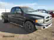 2004 Dodge 3500 ST with VIN 3D7MA48C24G200857, listed as a Copart auction lot 82495625 with 300,675 mi miles and Salvage title. Bid and sale history available at DreamBid. Image 4.