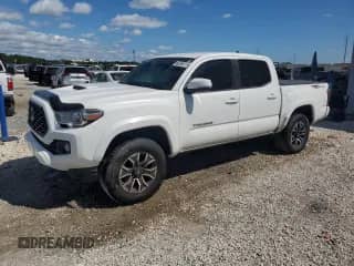 2020 Toyota Tacoma SR5 with VIN 3TMAZ5CNXLM128164, listed as a Copart auction lot 71077555 with 79,553 mi miles and Clean title. Bid and sale history available at DreamBid. Image 1.