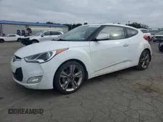 2016 Hyundai Veloster с VIN KMHTC6AD0GU253438, выставлен на аукционе Copart как лот 80940225 с пробегом 79 627 миль миль и Чистый • Clean title. История ставок и продаж доступна на DreamBid. Изображение 1.