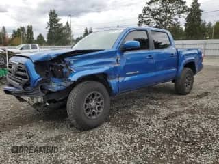 2018 Toyota Tacoma SR5 z VIN 3TMAZ5CN1JM054338, wystawiony jako Copart lot #82171125 z przebiegiem 86 480 mil mil oraz Szkoda całkowita • Salvage title. Historia ofert i sprzedaży dostępna na DreamBid. Obrazek 1.