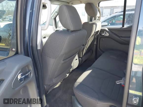 2014 Nissan Frontier S with VIN 1N6AD0EV7EN769521, listed as a IAAI auction lot 41825375 with 102,792 mi miles and . Bid and sale history available at DreamBid. Image 8.