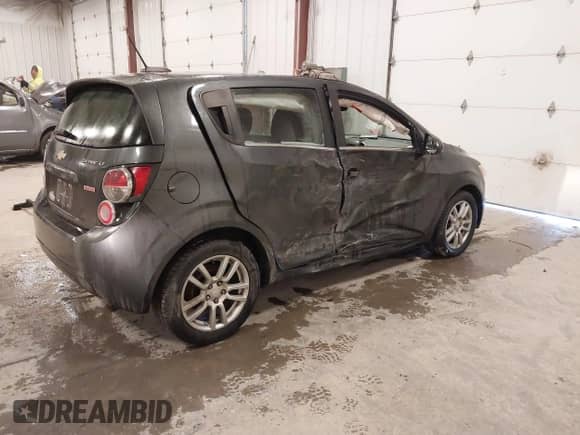 2016 Chevrolet Sonic LT with VIN 1G1JC6SB5G4183436, listed as a IAAI auction lot 41025761 with 123,703 mi miles and . Bid and sale history available at DreamBid. Image 4.