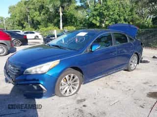 2015 Hyundai Sonata Sport z VIN 5NPE34AF0FH032577, wystawiony jako IAAI lot #42997102 z przebiegiem 258 309 mil mil oraz . Historia ofert i sprzedaży dostępna na DreamBid. Obrazek 2.