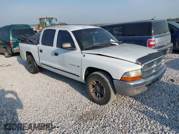 2001 Dodge Dakota Sport with VIN 1B7HL2AN61S297510, listed as a IAAI auction lot 43232339 with 216,879 mi miles and . Bid and sale history available at DreamBid. Image 1.