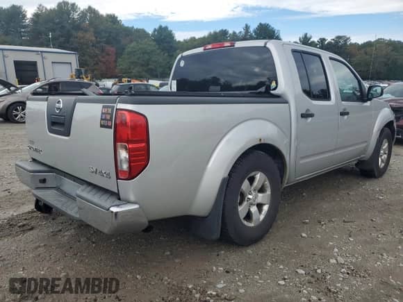 2012 Nissan Frontier SL with VIN 1N6AD0EV7CC410940, listed as a Copart auction lot 85820055 with 180,922 mi miles and Salvage title. Bid and sale history available at DreamBid. Image 3.