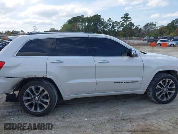 2018 Jeep Grand Cherokee Overland with VIN 1C4RJFCT4JC431275, listed as a IAAI auction lot 41931665 with 99,097 mi miles and . Bid and sale history available at DreamBid. Image 13.