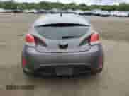 2014 Hyundai Veloster z VIN KMHTC6AD0EU196106, wystawiony jako Copart lot #69494305 z przebiegiem 102 472 mil mil oraz Szkoda całkowita • Salvage title. Historia ofert i sprzedaży dostępna na DreamBid. Obrazek 6.