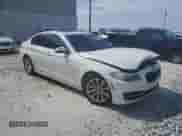 2014 BMW 5 Series 535d with VIN WBAXA5C54ED690428, listed as a Copart auction lot 65512135 with 122,813 mi miles and Salvage title. Bid and sale history available at DreamBid. Image 4.