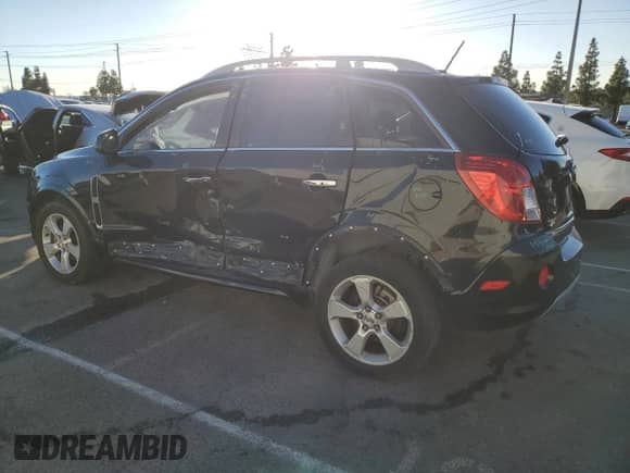 2014 Chevrolet Captiva Sport LTZ z VIN 3GNAL4EK6ES569410, wystawiony jako Copart lot #79771094 z przebiegiem 142 157 mil mil oraz Szkoda całkowita • Salvage title. Historia ofert i sprzedaży dostępna na DreamBid. Obrazek 2.