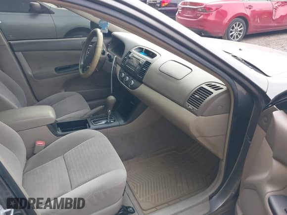 2005 Toyota Camry STD with VIN 4T1BE32K05U640893, listed as a IAAI auction lot 42909908 with 155,257 mi miles and . Bid and sale history available at DreamBid. Image 5.