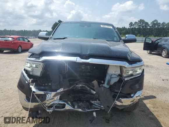 2019 Ram 1500 Limited z VIN 1C6SRFHT2KN517541, wystawiony jako Copart lot #68911275 z przebiegiem 158 501 mil mil oraz Szkoda całkowita • Salvage title. Historia ofert i sprzedaży dostępna na DreamBid. Obrazek 5.