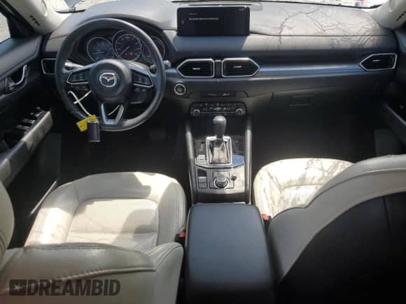 2022 Mazda CX-5 S Carbon Edition with VIN JM3KFBCMXN1553233, listed as a Copart auction lot 69819915 with 25,990 mi miles and Salvage title. Bid and sale history available at DreamBid. Image 8.