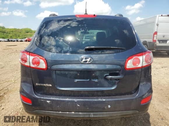 2012 Hyundai Santa Fe GLS с VIN 5XYZG4AG1CG110026, выставлен на аукционе Copart как лот 56843185 с пробегом 200 700 миль миль и Списание • Salvage title. История ставок и продаж доступна на DreamBid. Изображение 6.