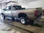 2000 Dodge 1500 with VIN 3B7HF13Z4YG151769, listed as a Copart auction lot 84264055 with 113,816 mi miles and Salvage title. Bid and sale history available at DreamBid. Image 2.