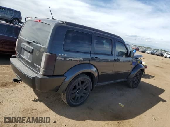 2011 Dodge Nitro Heat с VIN 1D4PU4GK5BW574663, выставлен на аукционе Copart как лот 71581504 с пробегом 101 237 миль миль и Списание • Salvage title. История ставок и продаж доступна на DreamBid. Изображение 3.