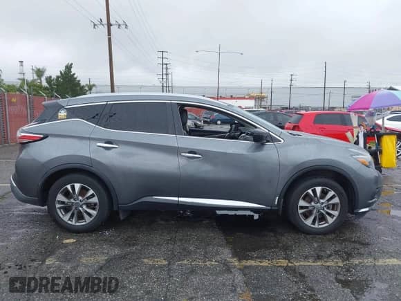 2018 Nissan Murano SV z VIN 5N1AZ2MG7JN157697, wystawiony jako IAAI lot #42190907 z przebiegiem 79 615 mil mil oraz . Historia ofert i sprzedaży dostępna na DreamBid. Obrazek 13.
