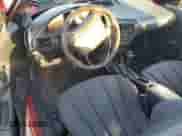 1999 Chevrolet Cavalier z VIN 1G1JC1242X7312106, wystawiony jako Copart lot #77560574 z przebiegiem Nie podano mil oraz Czysty tytuł • Clean title. Historia ofert i sprzedaży dostępna na DreamBid. Obrazek 8.