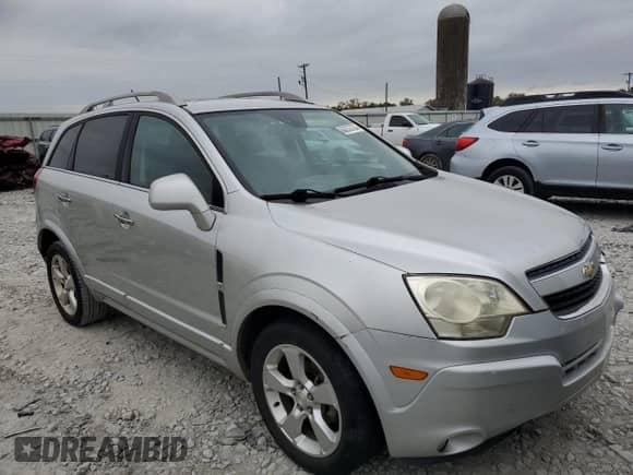 2014 Chevrolet Captiva Sport LTZ z VIN 3GNAL4EK6ES637978, wystawiony jako Copart lot #80262024 z przebiegiem 162 634 mil mil oraz Czysty tytuł • Clean title. Historia ofert i sprzedaży dostępna na DreamBid. Obrazek 4.
