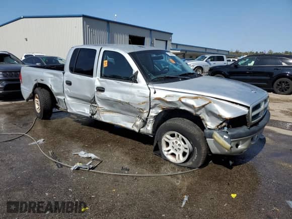 2002 Dodge Dakota Sport z VIN 1B7HL38N32S503296, wystawiony jako Copart lot #75428444 z przebiegiem 239 482 mil mil oraz Szkoda całkowita • Salvage title. Historia ofert i sprzedaży dostępna na DreamBid. Obrazek 4.