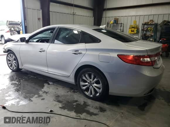2014 Hyundai Azera с VIN KMHFG4JG0EA355997, выставлен на аукционе Copart как лот 59851335 с пробегом Не указан миль и Списание • Salvage title. История ставок и продаж доступна на DreamBid. Изображение 2.