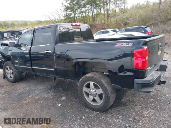 2016 Chevrolet Silverado 2500HD LTZ z VIN 1GC1KWE8XGF182992, wystawiony jako IAAI lot #41636102 z przebiegiem 234 240 mil mil oraz . Historia ofert i sprzedaży dostępna na DreamBid. Obrazek 14.