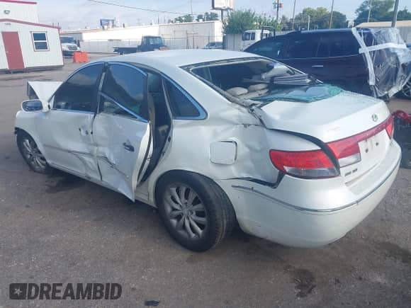 2006 Hyundai Azera SE z VIN KMHFC46FX6A086839, wystawiony jako IAAI lot #42725645 z przebiegiem Nie podano mil oraz . Historia ofert i sprzedaży dostępna na DreamBid. Obrazek 3.