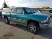 1997 Dodge 1500 with VIN 3B7HF13Y0VG734553, listed as a Copart auction lot 82716215 with 186,122 mi miles and Clean title. Bid and sale history available at DreamBid. Image 4.