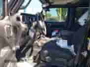 2023 Jeep Wrangler Sport S with VIN 1C4HJXDG7PW617662, listed as a IAAI auction lot 42725503 with Not provided miles and . Bid and sale history available at DreamBid. Image 5.