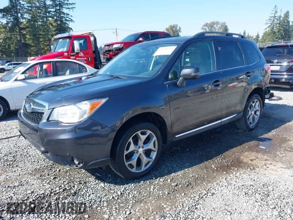 2016 Subaru Forester Touring with VIN JF2SJAXC1GH546038, listed as a IAAI auction lot 43376379 with 144,921 mi miles and . Bid and sale history available at DreamBid. Image 17.