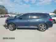 2015 Nissan Pathfinder SL with VIN 5N1AR2MN9FC641761, listed as a IAAI auction lot 41554742 with 141,353 mi miles and . Bid and sale history available at DreamBid. Image 15.