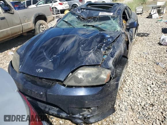 2006 Hyundai Tiburon GT с VIN KMHHN65FX6U191069, выставлен на аукционе Copart как лот 68652734 с пробегом Не указан миль и Чистый • Clean title. История ставок и продаж доступна на DreamBid. Изображение 5.