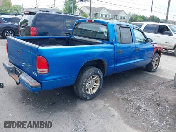 2001 Dodge Dakota Sport with VIN 1B7GL2AN31S115001, listed as a IAAI auction lot 42452634 with Not provided miles and . Bid and sale history available at DreamBid. Image 4.