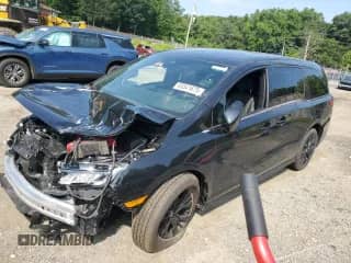 2025 Honda Odyssey Sport-L z VIN 5FNRL6H74SB049810, wystawiony jako Copart lot #65541675 z przebiegiem Nie podano mil oraz Nie do naprawy • Non repairable. Historia ofert i sprzedaży dostępna na DreamBid. Obrazek 1.