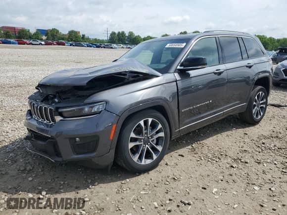 2023 Jeep Grand Cherokee Overland z VIN 1C4RJHDG3P8737215, wystawiony jako Copart lot #58858905 z przebiegiem 28 364 mil mil oraz Szkoda całkowita • Salvage title. Historia ofert i sprzedaży dostępna na DreamBid. Obrazek 1.