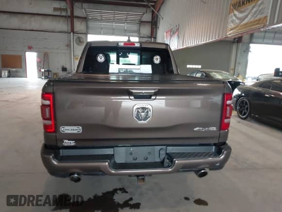 2020 Ram 1500 Longhorn with VIN 1C6SRFKT1LN275397, listed as a IAAI auction lot 42733634 with 101,019 mi miles and . Bid and sale history available at DreamBid. Image 16.