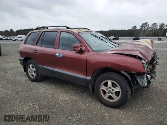 2002 Hyundai Santa Fe GLS с VIN KM8SC13D12U296514, выставлен на аукционе Copart как лот 47805475 с пробегом 188 322 миль миль и Списание • Salvage title. История ставок и продаж доступна на DreamBid. Изображение 4.