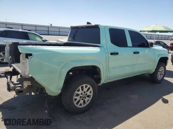 2024 Toyota Tacoma SR with VIN 3TYKD5HNXRT000886, listed as a Copart auction lot 66936505 with 21,648 mi miles and Salvage title. Bid and sale history available at DreamBid. Image 3.