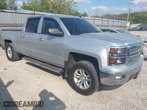 2014 Chevrolet Silverado 1500 LT with VIN 3GCUKREC0EG343333, listed as a IAAI auction lot 43328983 with 143,254 mi miles and . Bid and sale history available at DreamBid. Image 1.