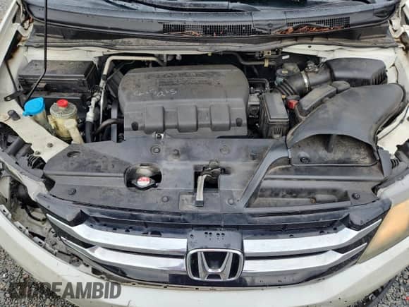 2015 Honda Odyssey LX with VIN 5FNRL5H20FB008529, listed as a Copart auction lot 81084685 with 128,269 mi miles and Salvage title. Bid and sale history available at DreamBid. Image 12.