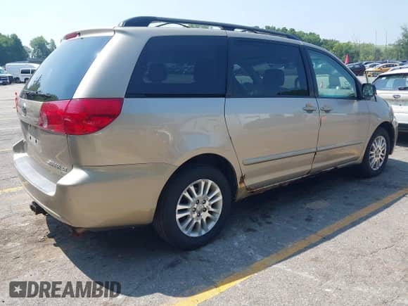 2008 Toyota Sienna LE with VIN 5TDBK23C28S016780, listed as a IAAI auction lot 42913654 with 236,276 mi miles and . Bid and sale history available at DreamBid. Image 4.