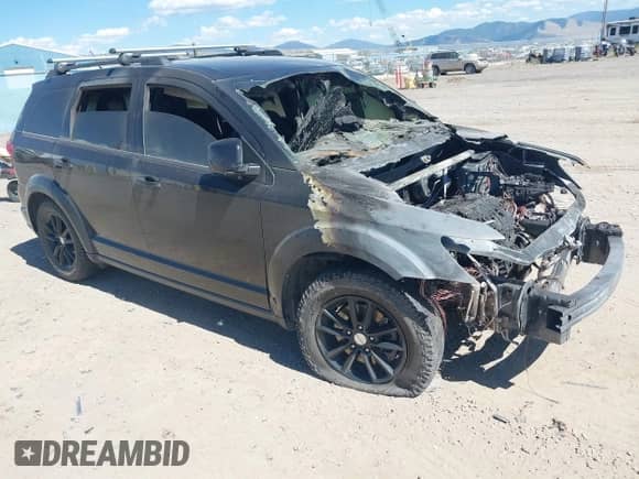 2013 Dodge Journey SXT with VIN 3C4PDCBB7DT729771, listed as a IAAI auction lot 42729241 with Not provided miles and . Bid and sale history available at DreamBid. Image 1.